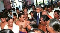 Mr. Wickremesinghe being led to the inaugural by Hindu priests, chanting blessings on him