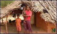 Sivakumar Naguleswary, a beneficiary at the Navatkadu settlement waits to receive her own plot of land (Click for a larger picture)