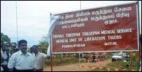 Trinco district Commander Sornam seen extreme left after unveiling the name board of Thyaka TheepamThileepan Memorial Service Medical Unit of LTTE.