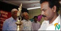 Trinco Poet Sikandithasan lighting the traditional oil lamp before the commencement of the conference ( L-R) Attorney -at-Law Mr.K.Sivapalan, Poet Puthuvai Ratnathurai and Mr.Elilan are seen