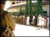 Parliamentarian Mr.Thurairetnasingham talks to Police officials at the scene (MP is with white shirt and Tamil national dress)