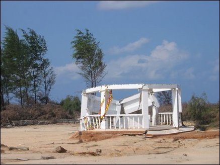 Annai Poopathy memorial hall destroyed by waves in Navalady.