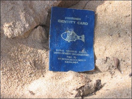 Battered identity card of a fisherman