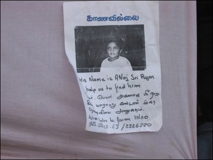 A poster of a missing boy, Anoj Srirajan, displayed in Methodist Central College welfare camp in Batticaloa.