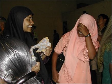 Muslim girls enjoying Patch Admas show