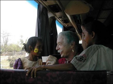 Dr. Patch Adams with children inside his bus