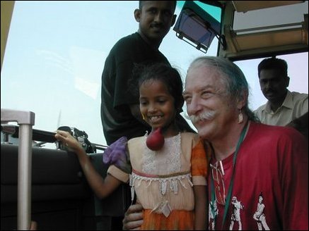 Dr. Patch Adams with a child
