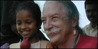 Dr. Patch Adams with a child