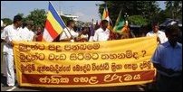 Condemn the anti Buddhist activities of Muslim extremists reads the banner