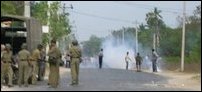 Police with tear gas and battons at the scene