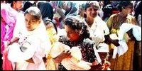 Mothers with infants gathered at Ilupaikulam to receive relief