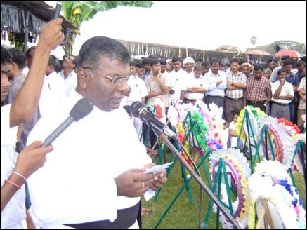 Kulandai Jesu, priest Annathas, paying tribute to slain students