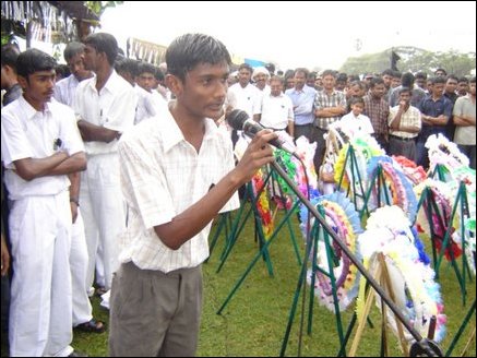 Fellow student T. Arunmaran addressing the mourners