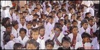Students and parents attending the opening ceremony of Kannaki Amman Vidyalayam