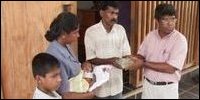 Jeyarajah family with 2 month old Jenosan receiving Rs.400,000
