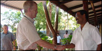Major General Ulf Henricsson, the outgoing SLMM Chief, shaking hands with LTTE Political Head S. P. Thamilchelvan