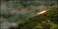 Sri Lanka's military fire a multi barrel rocket in Trincomalee in northeastern Sri Lanka August 2, 2006. (Reuters)