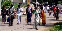 Desperate people, chased away by the SLA, returning home.
