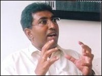 Dr. Harsha de Silva