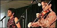Couple performing together