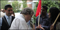 Rabbi Danny Rich, Chief Executive of Liberal Judaism (c) and Rabbi David Mitchell (l) sign ‘Boycott Sri Lankan Cricket’ postcards