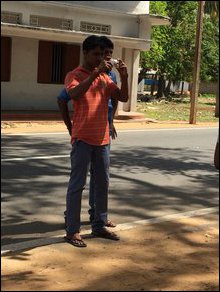 SL Mil Intelligence operative taking photo
