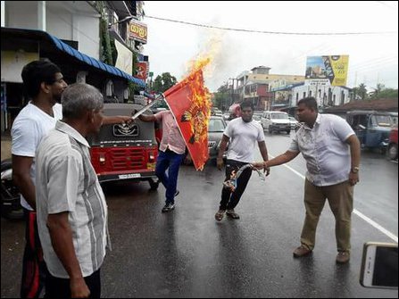 Sinhalese burning Tiger flag